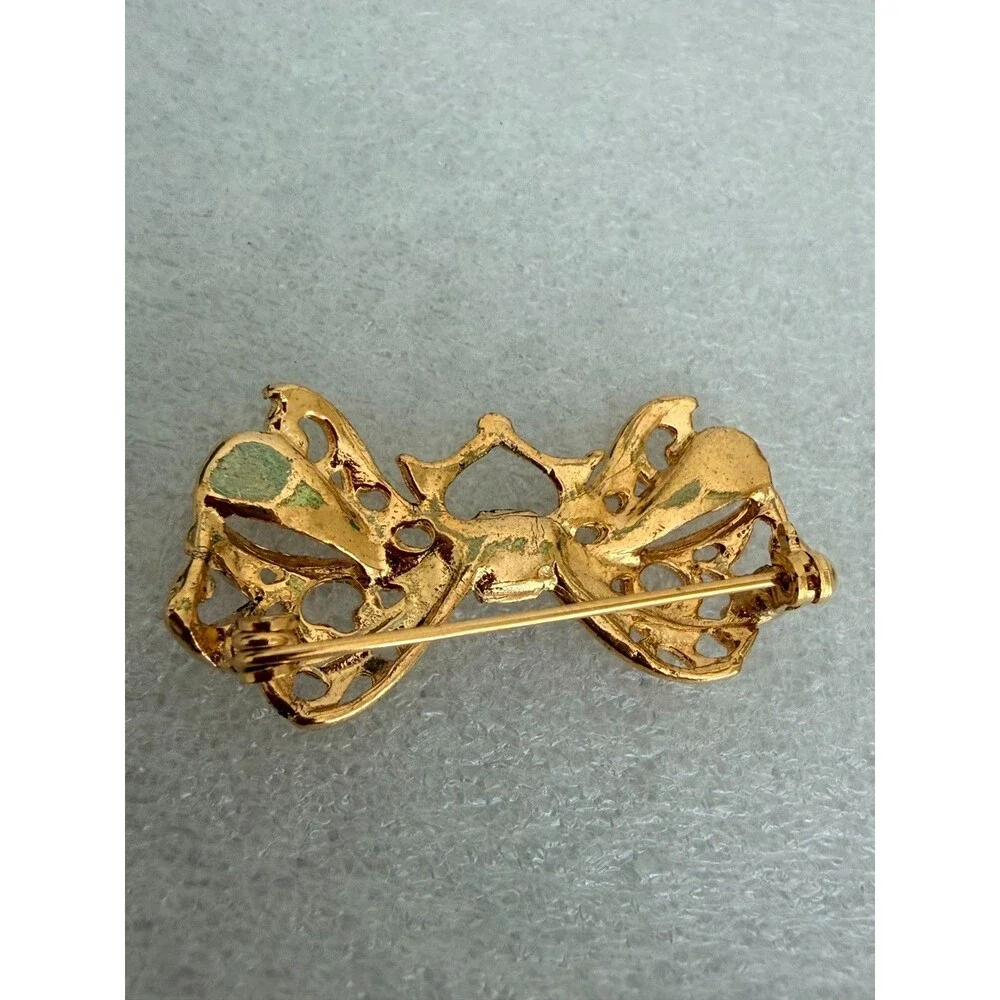 Vintage Gold Tone Openwork Filigree Bow Brooch Rhinestone Accent Pin